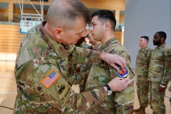 U.S. Army Garrison Wiesbaden Soldiers adopt new patch in ceremony